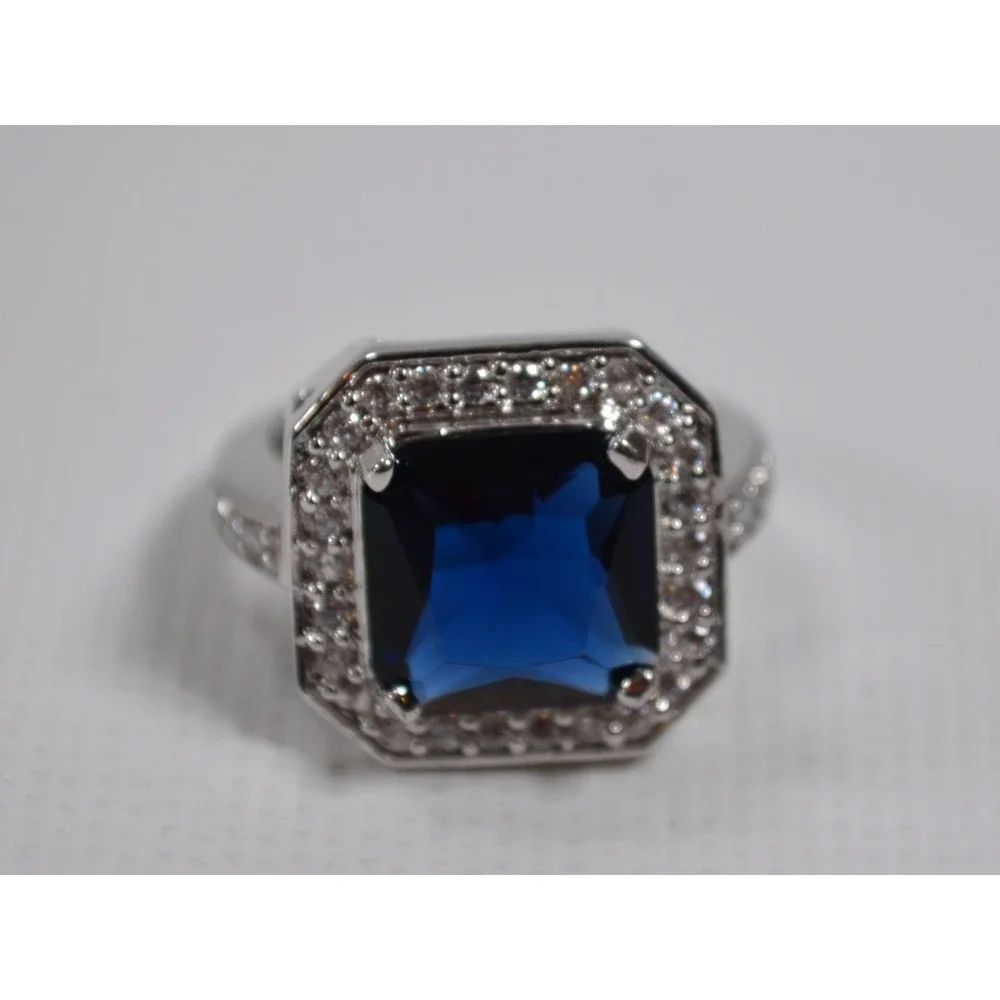 Silver Tone Ring Sz 6.75 w/ Large Blue Setting Sounded By Tiny Clear Rhinestones